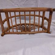 Woven bamboo magazine rack from the 1970s