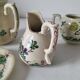 Japanese-style tea set in cracked earthenware with chrysanthemum flowers