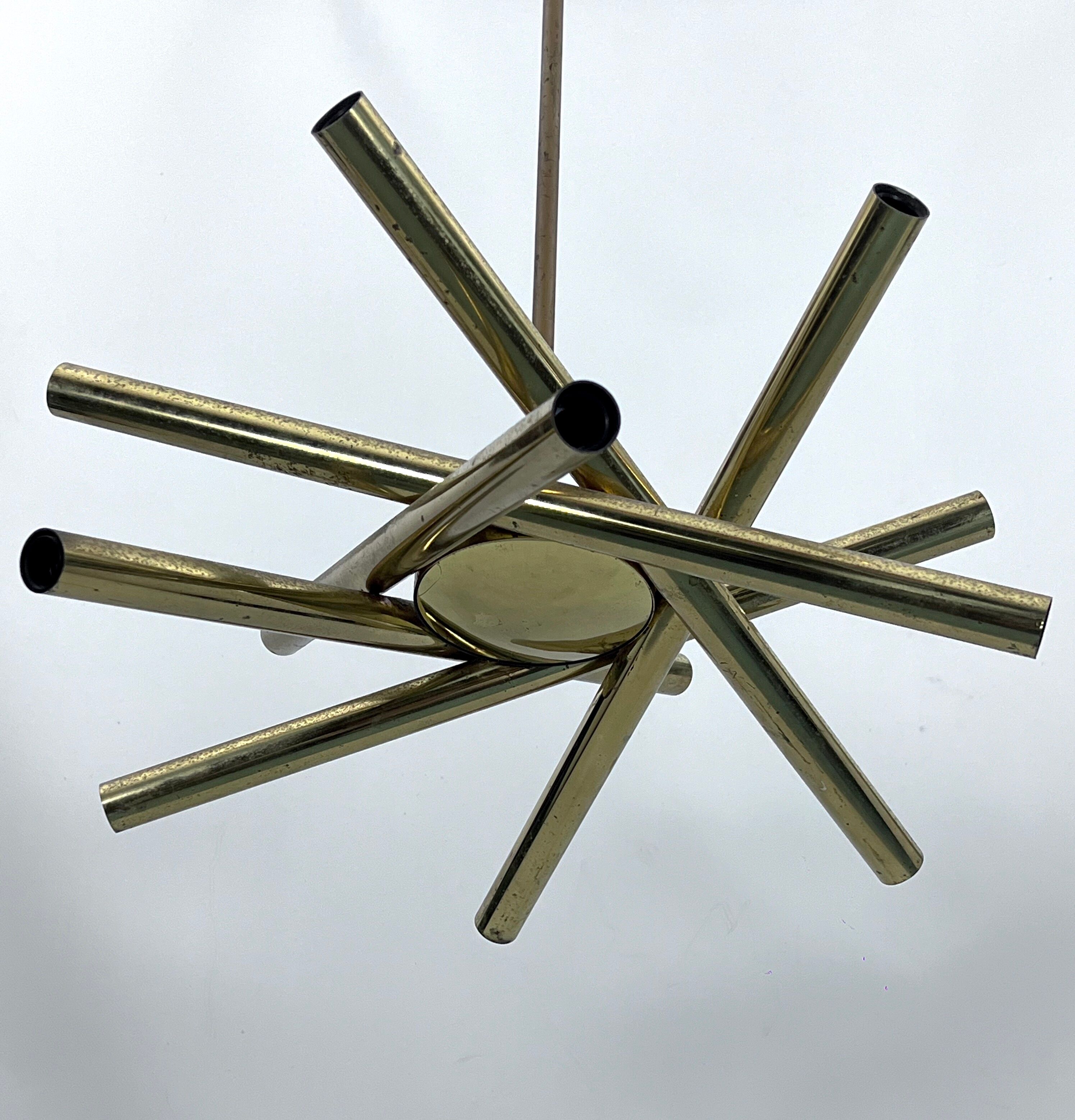 Mid-Century Modern 12 lights Brass chandelier by Stilnovo. Italy 1960s
