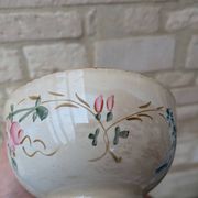 Old opaque porcelain bowl from Gien with a floral decoration.