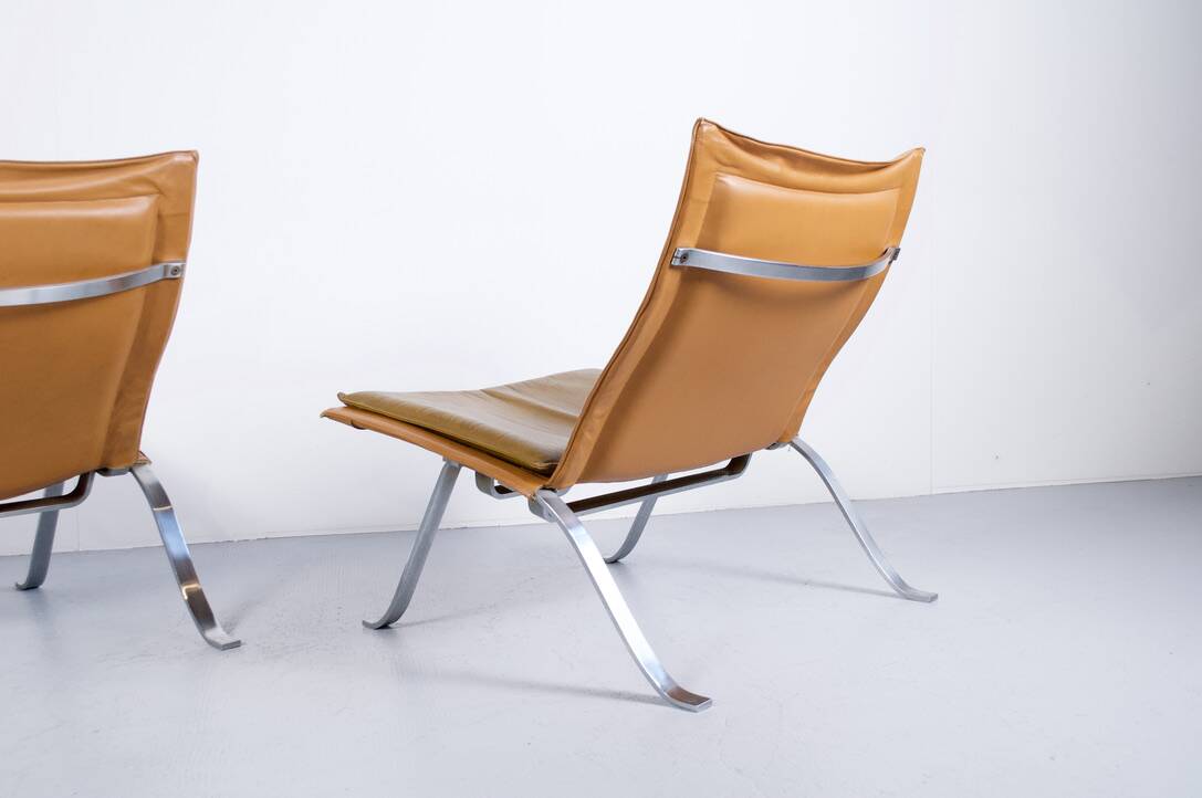 Imposing pair of leather and steel armchairs from the 1960s