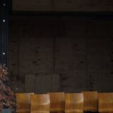 Set of 6 industrial stackable chairs by Niels Larsen, black metal and oak, 1960s.