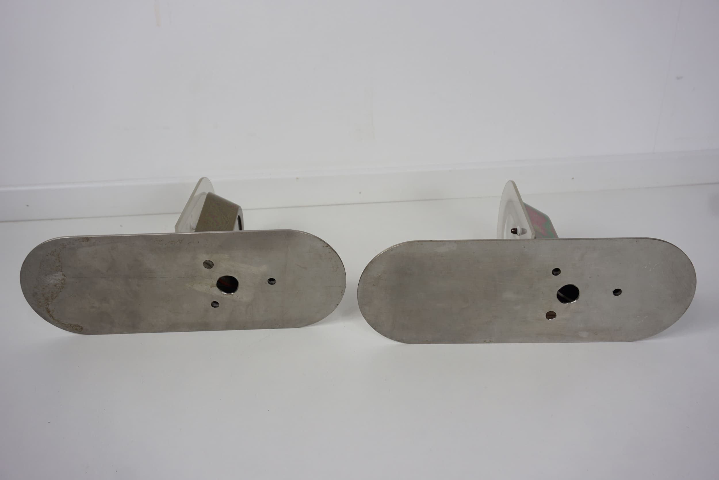 Pair of stainless steel and glass wall lamps
