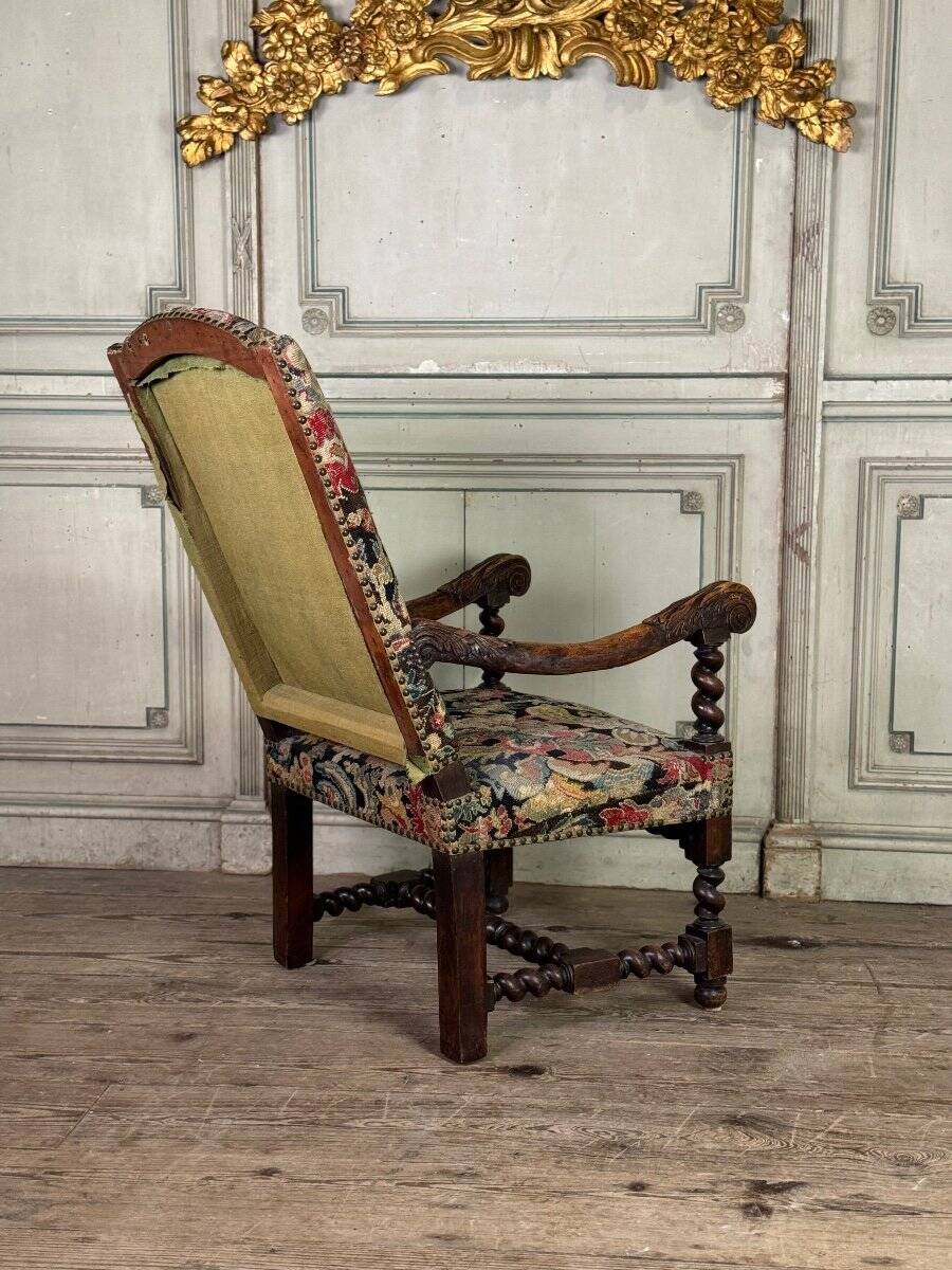Carved walnut and tapestry armchair, late 17th century