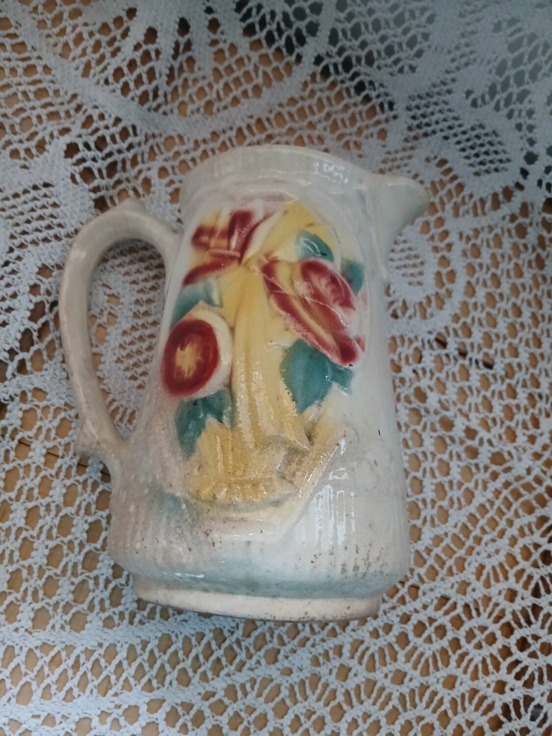 Antique earthenware pitcher