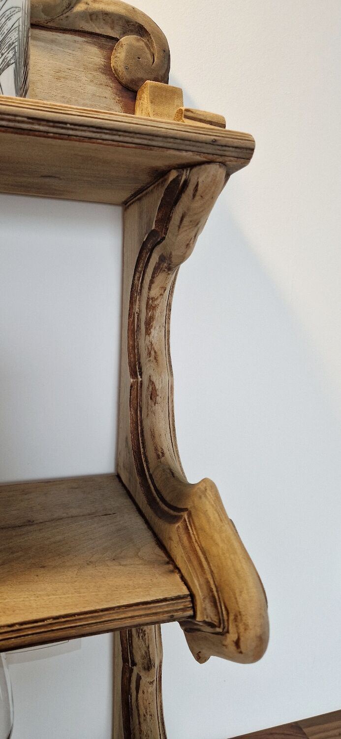 Old wall shelf carved in walnut