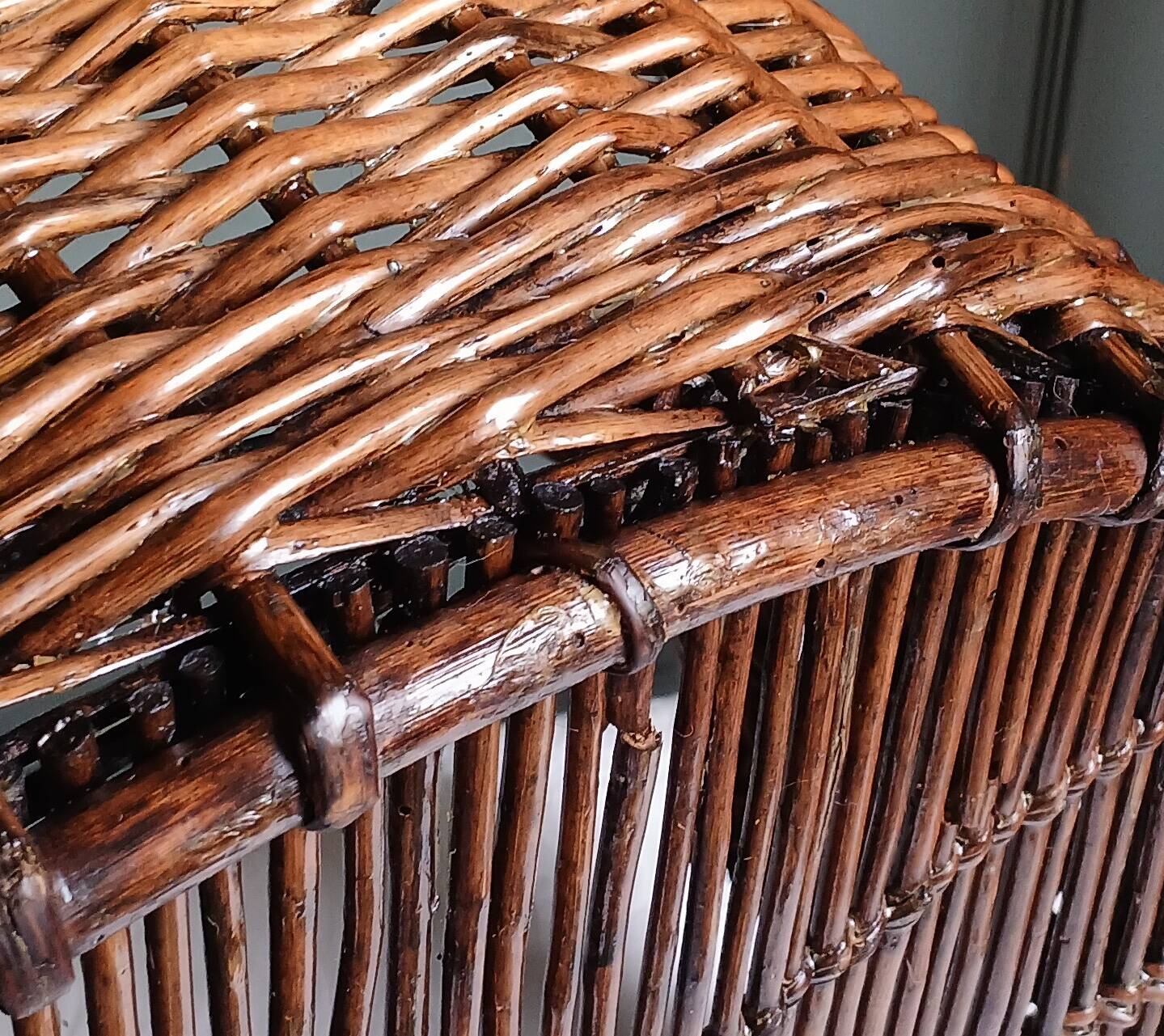 Handmade woven and dyed willow harvest basket.