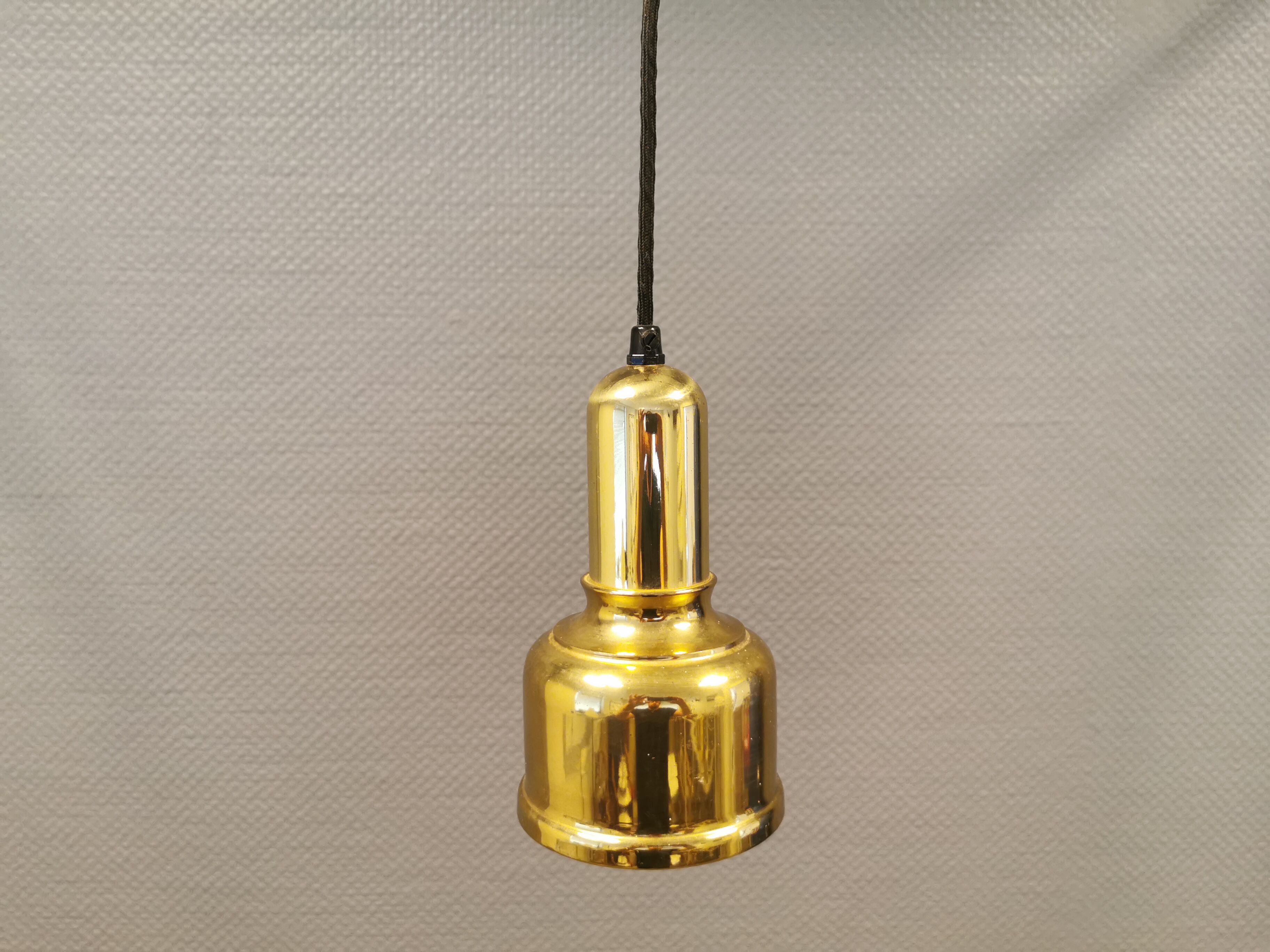 Small golden Danish hanging lamp in metal and brass.
