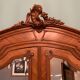 Louis XV Rocaille cabinet in walnut with bevelled mirrors