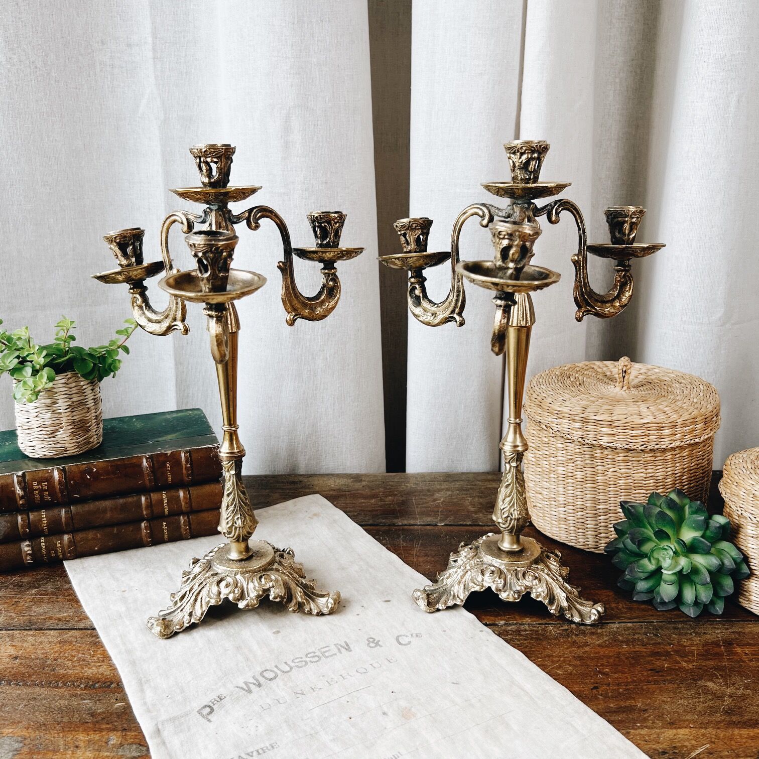 Duo of antique bronze chandeliers