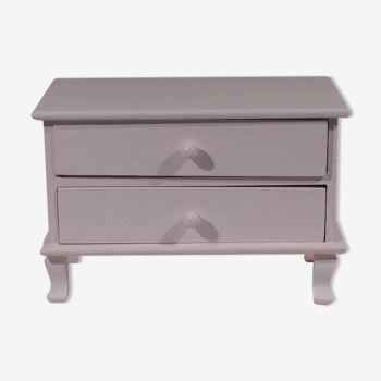 Mini pastel pink dresser for storing jewelry