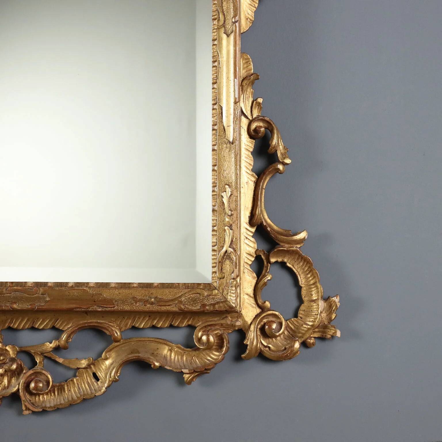 Antique baroque mirror in carved and gilded wood, Italy, 20th century
