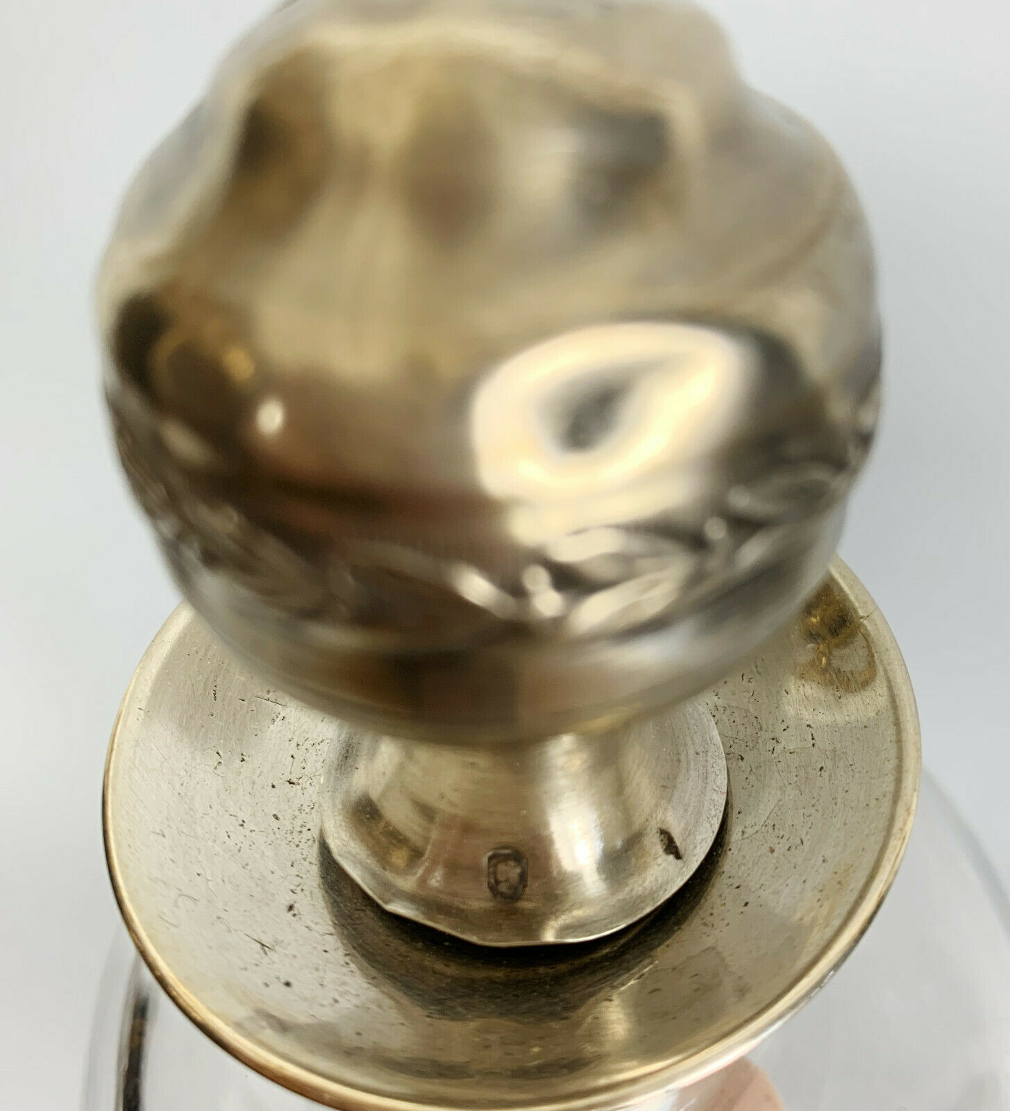 Blown glass carafe with silver frame and cap