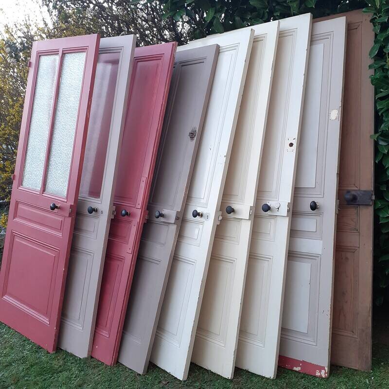 Series of 9 old communication doors, solid wood, both solid and glazed.