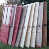 Series of 9 old communication doors, solid wood, both solid and glazed.