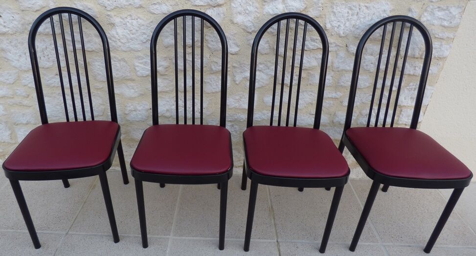 4 metal chairs with burgundy imitation leather seats from the Souvignet brand