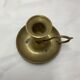 Brass hand candle holder