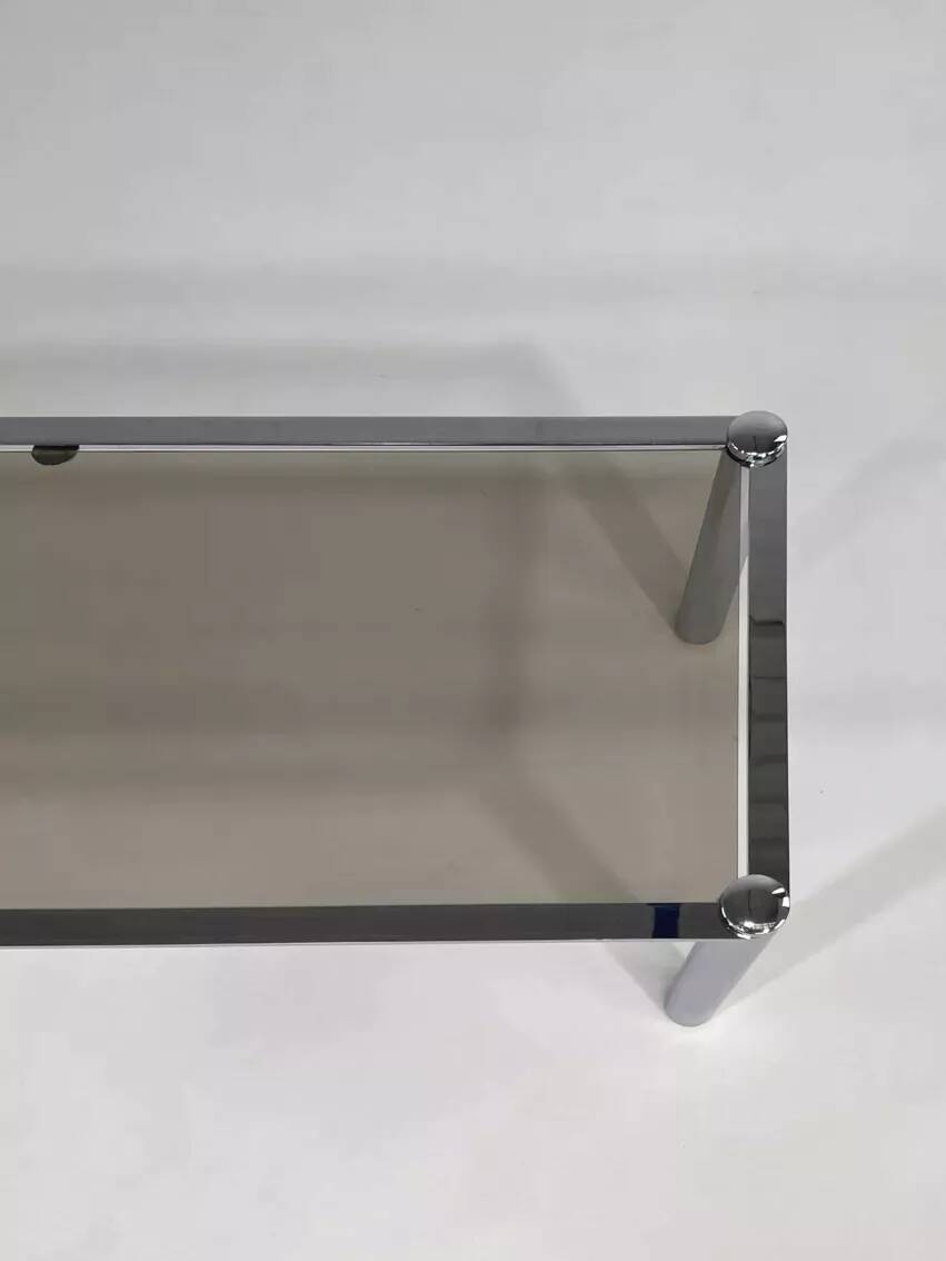 Rectangular coffee table from the 70s in chrome steel and smoked glass top