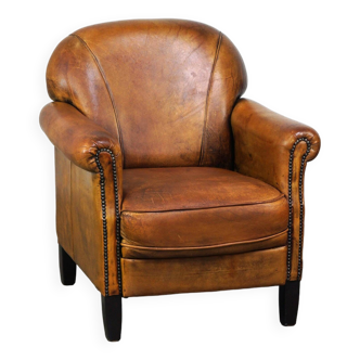 Nice vintage sheepskin armchair with beautiful colors and a comfortable seat