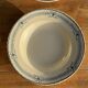 Set of 4 vintage deep plates in faience with blue decoration by Boulenger & Cie D2.