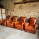 Lot de 4 fauteuils club, Cognac