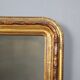 Antique carved and gilded wooden mirror, Italy, early 20th century.