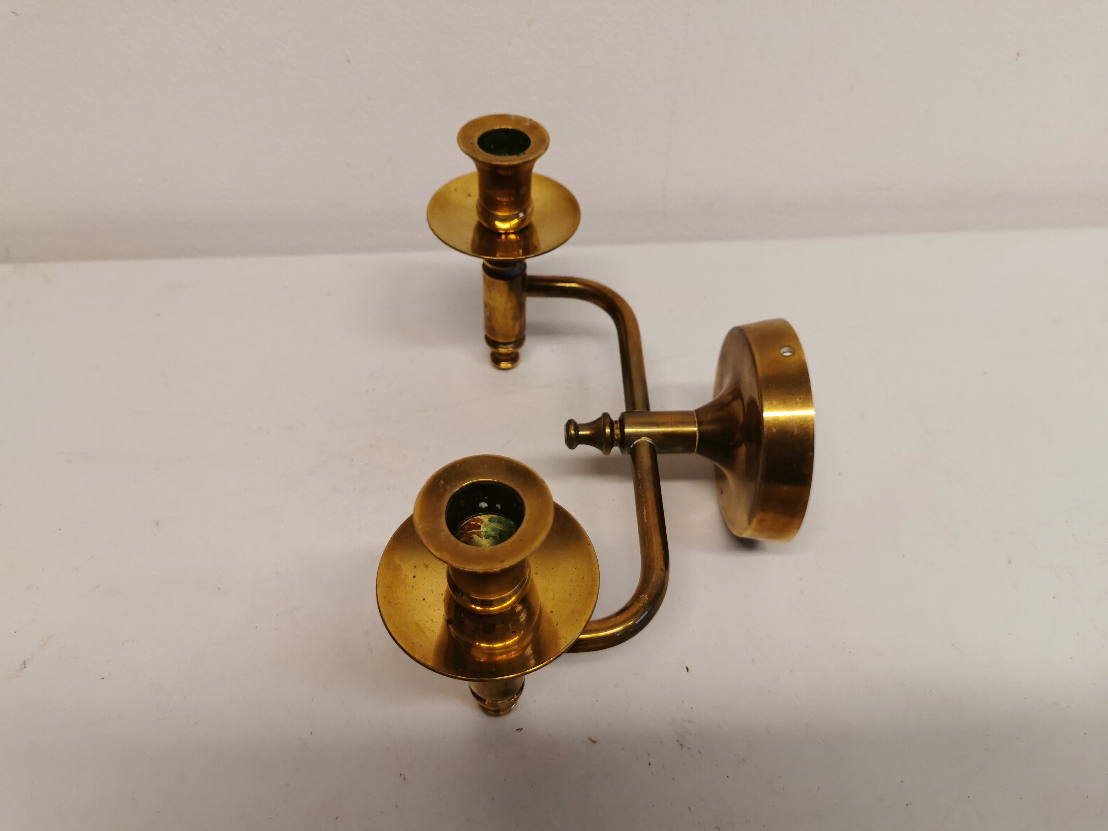 Classic Danish wall hung design candlestick in solid brass
