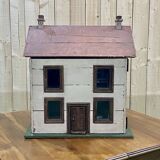 Wooden 1950s doll house with furniture