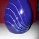 Blue lacquered vase with flowers & applied leaves