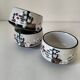 Three glazed ceramic bowls with raised graphic decoration, 1970s.