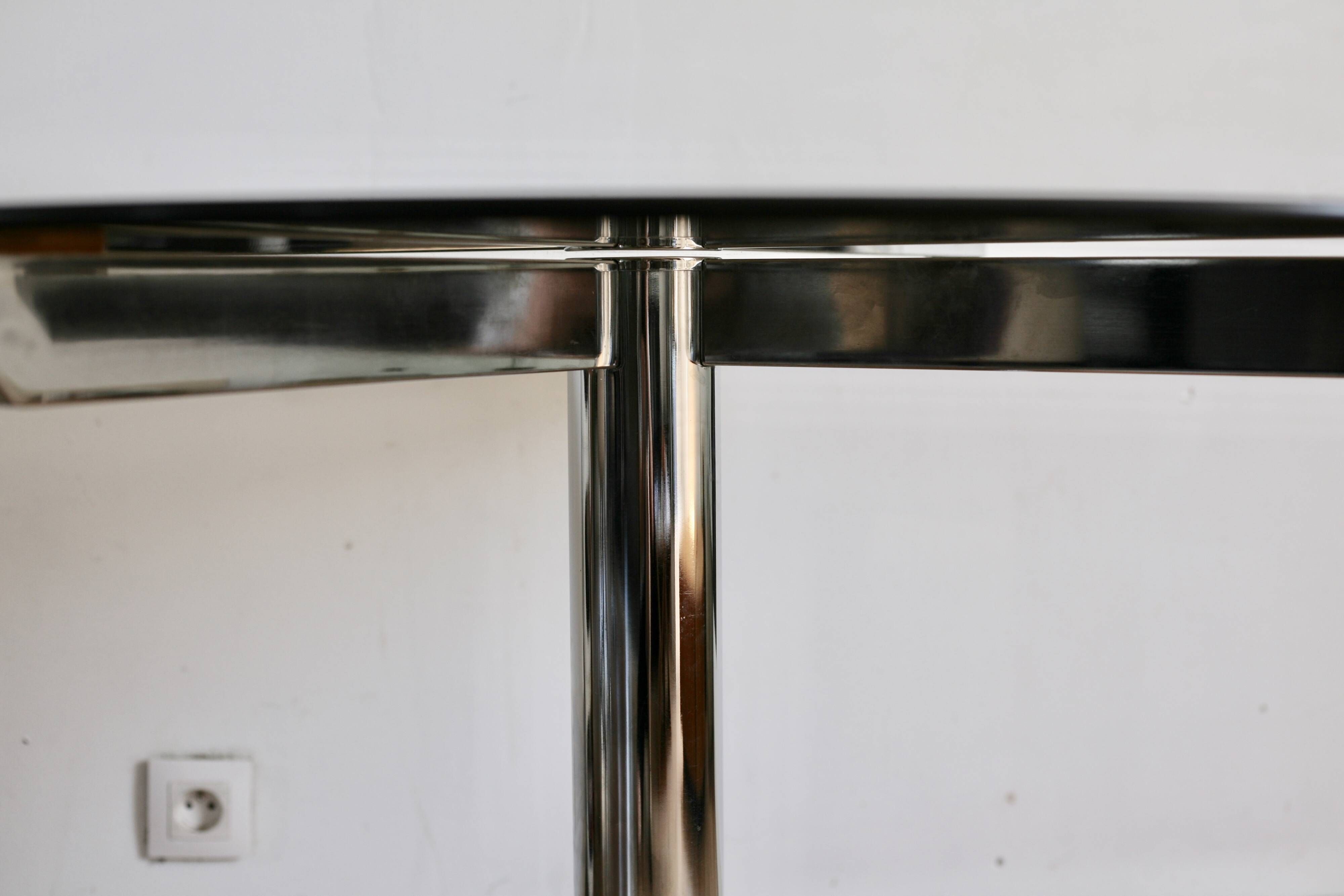Glass and steel table attributed to Florence Knoll, Roche Bobois edition, 1970s.