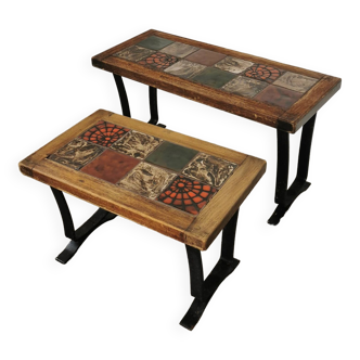 Pair of nesting tables in ceramic and metal from the 1970s.