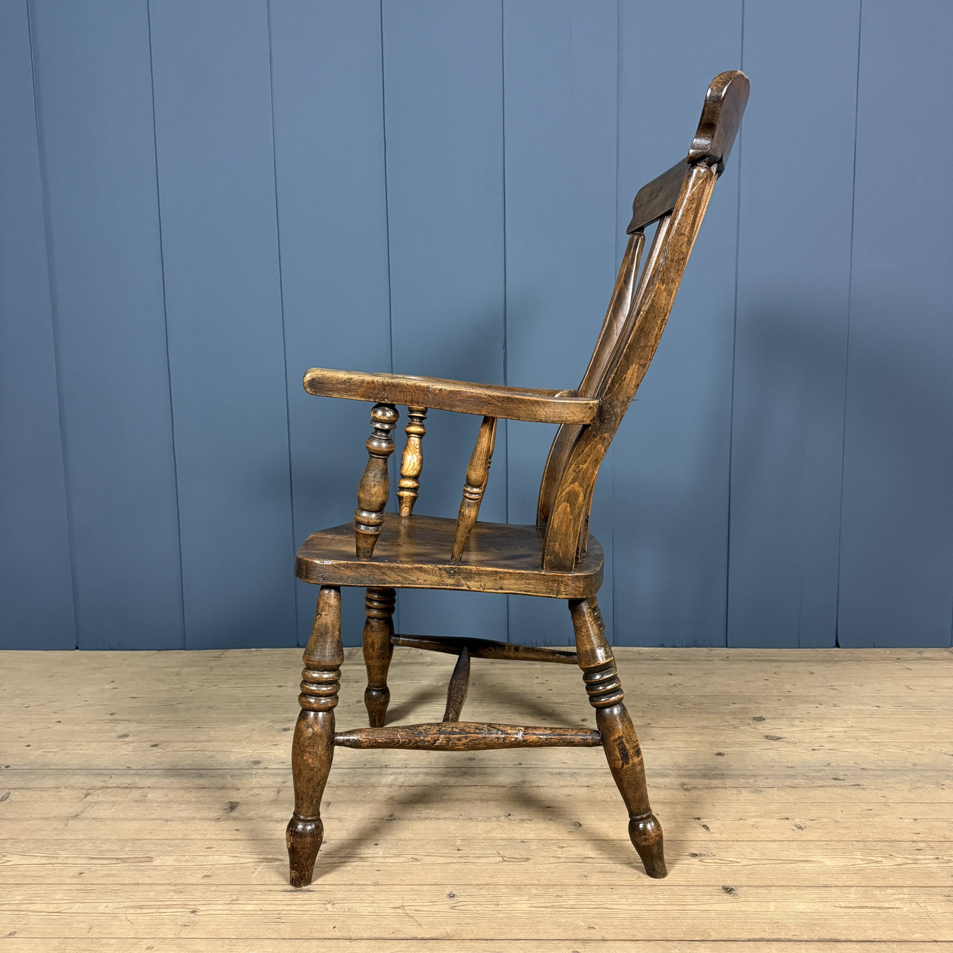 Brown English Windsor armchair with high back
