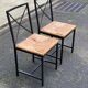 2 Scandinavian chairs with black steel and straw from IKEA Granas.