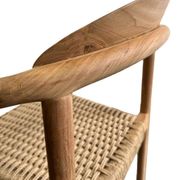 Solid wood chair with weaved seat and armrests