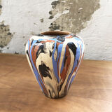 Vase dripping in varnished earth