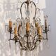 Neoclassical bronze chandelier with 8 lights, tassels and dagger