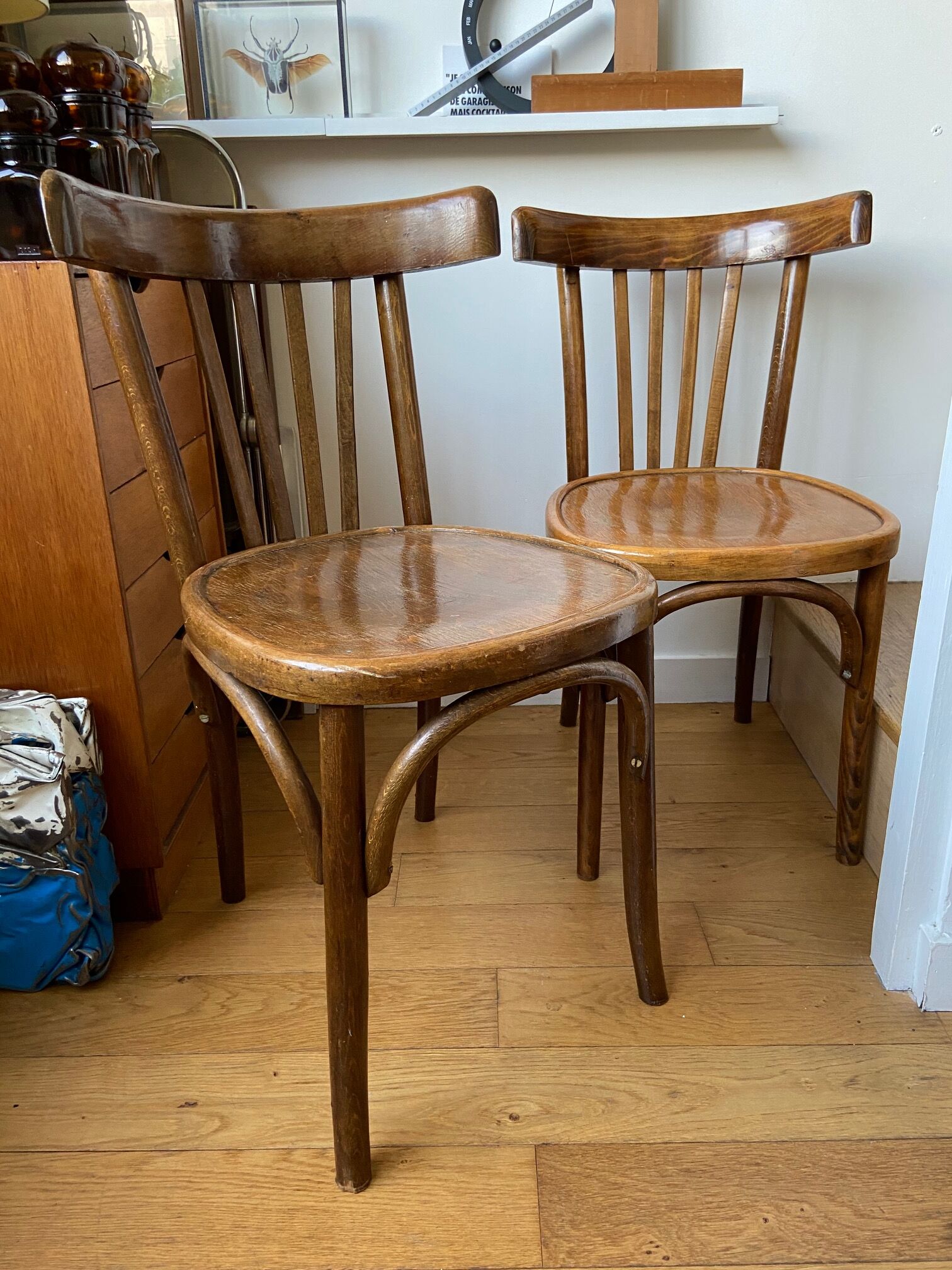 Pair of wooden bistro chairs