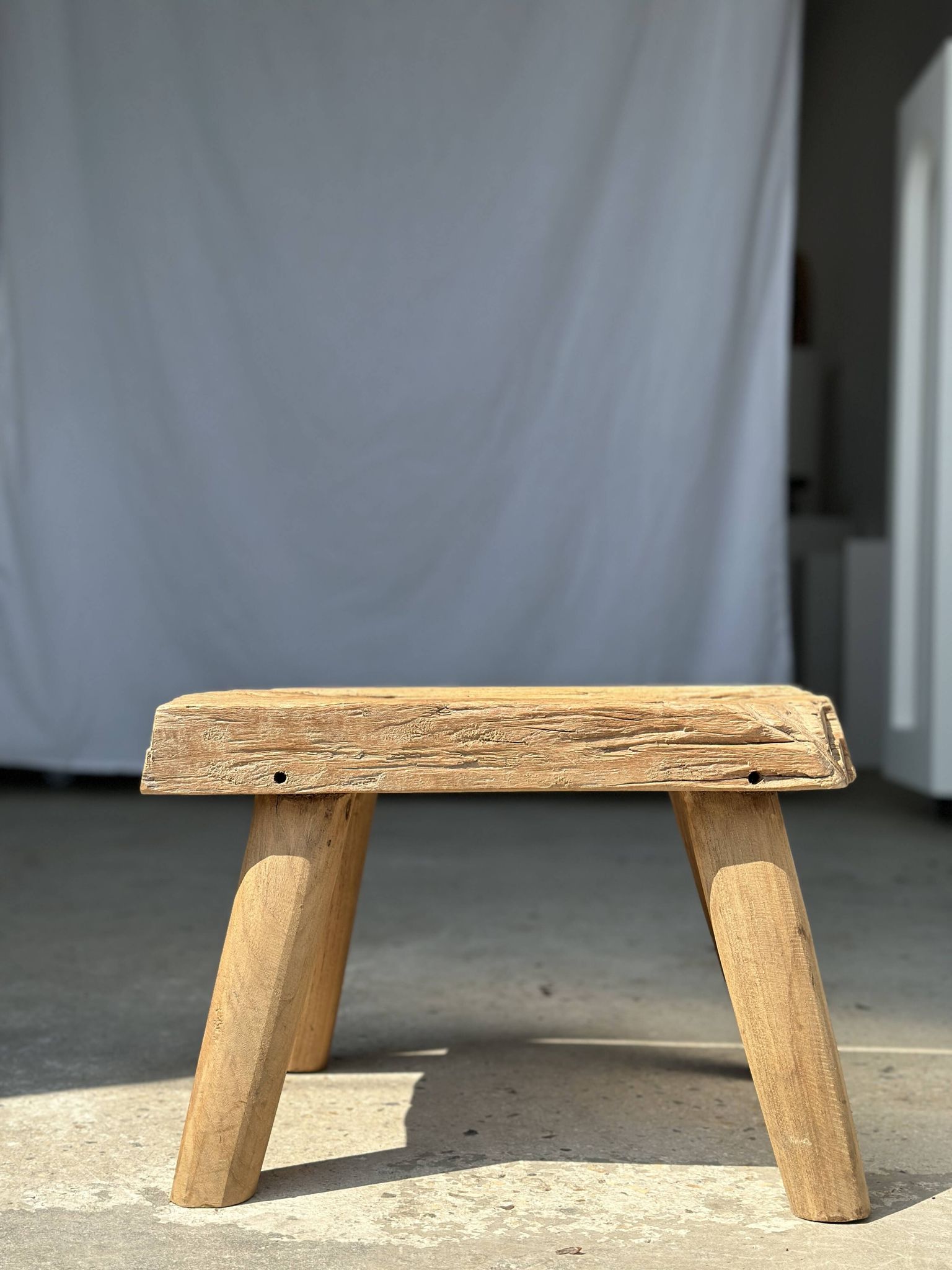 Small side table or stool in four-legged blond teak H:30 L43 l30
