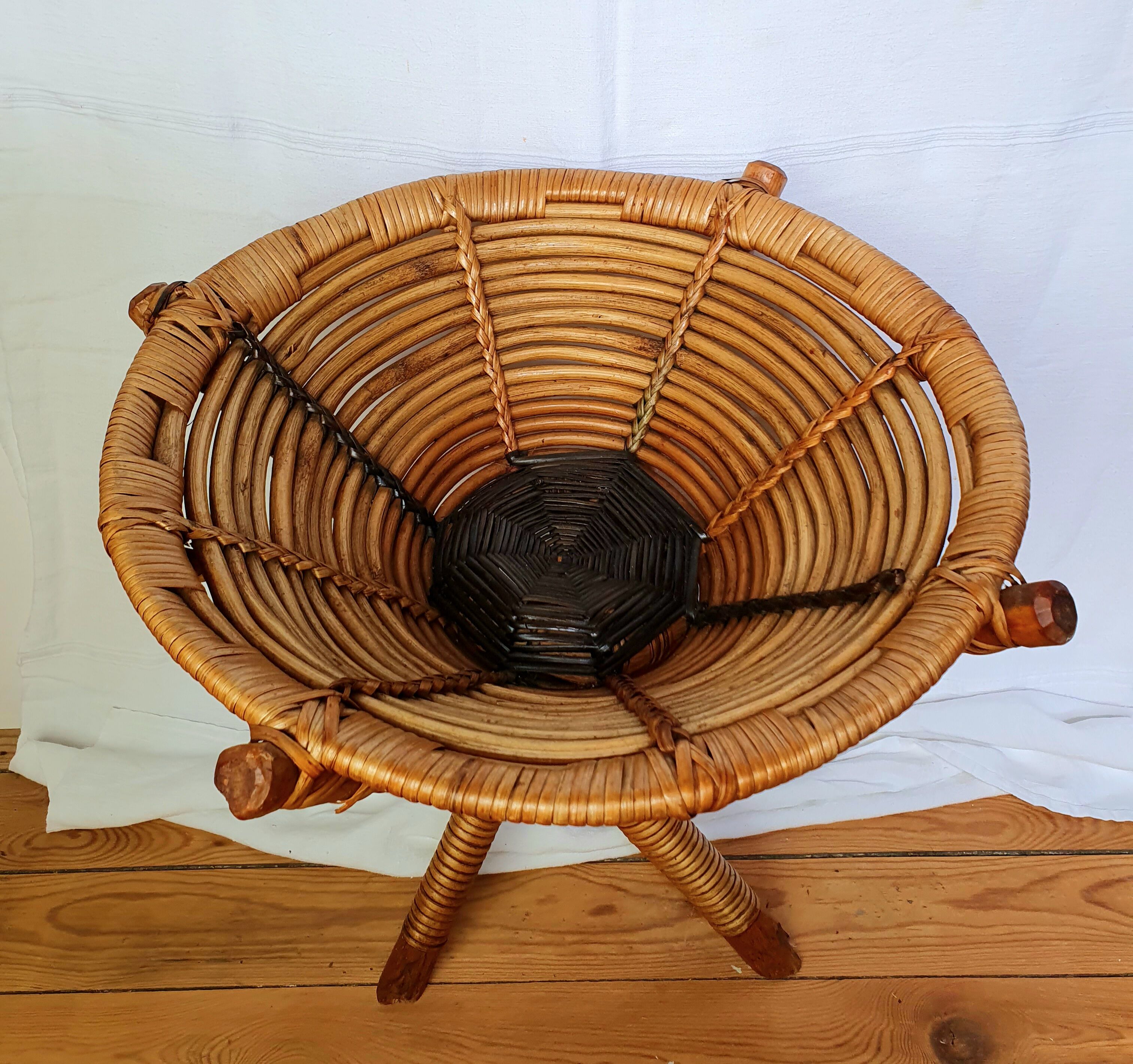 Basket on wooden and woven wicker legs 1950