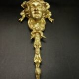 Pair of large Louis XVI style sconces with male faces - bronze
