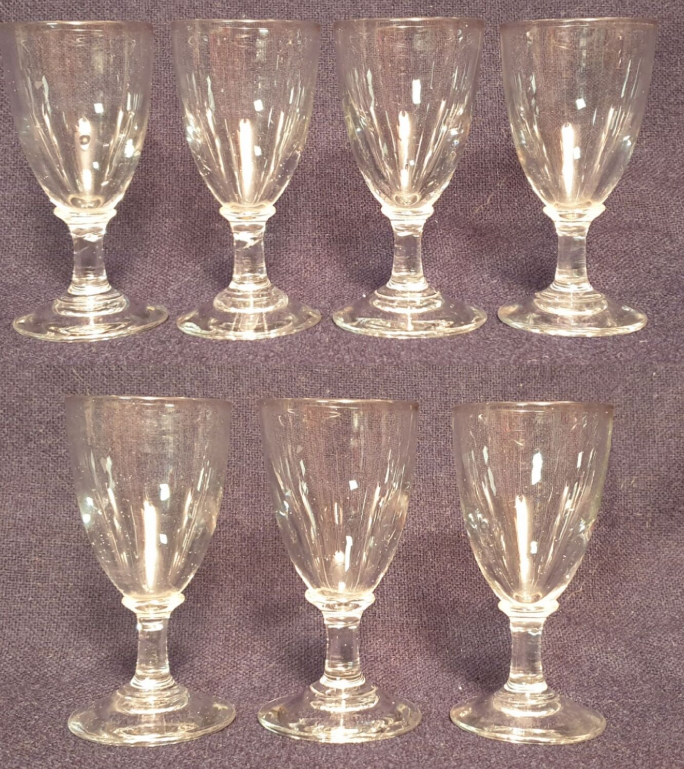 7 antique shot glasses