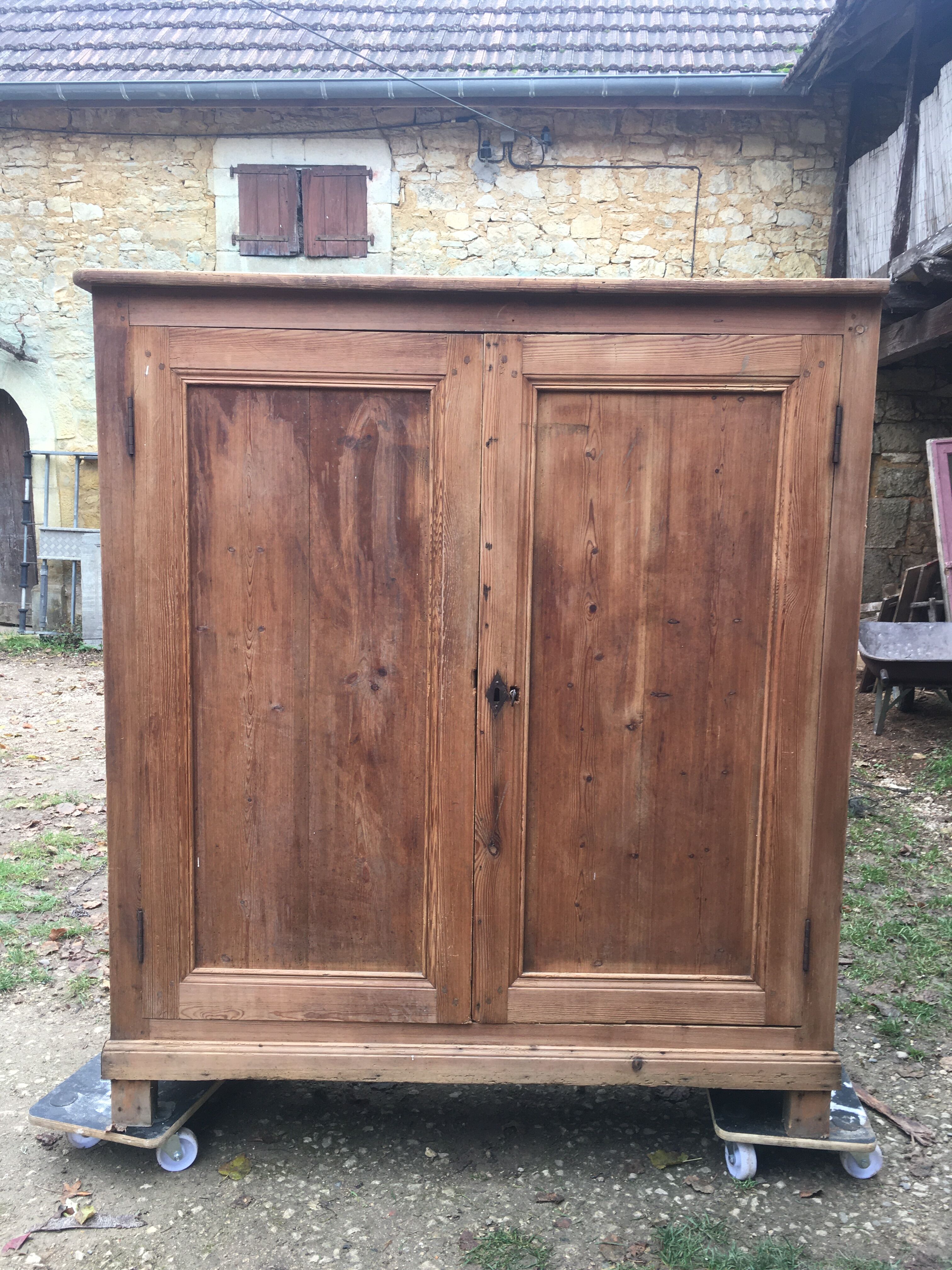 Wooden cabinet with interior doors