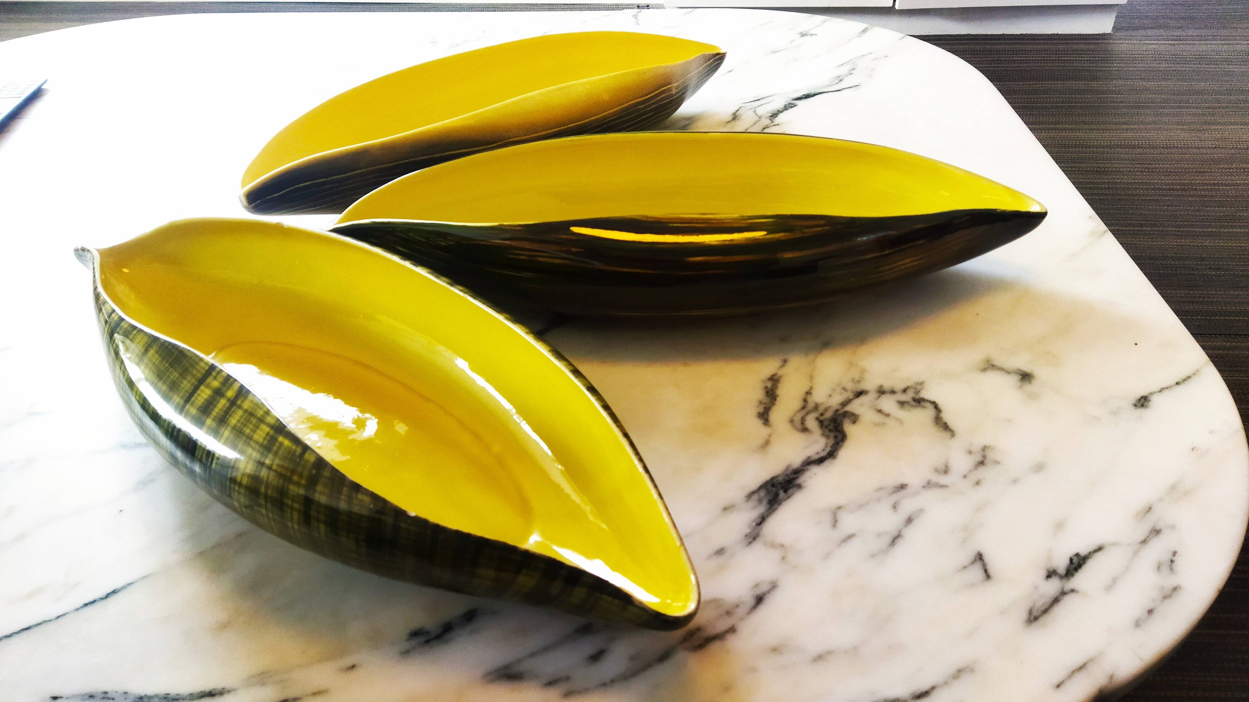 Set of three 1950s paddle cups