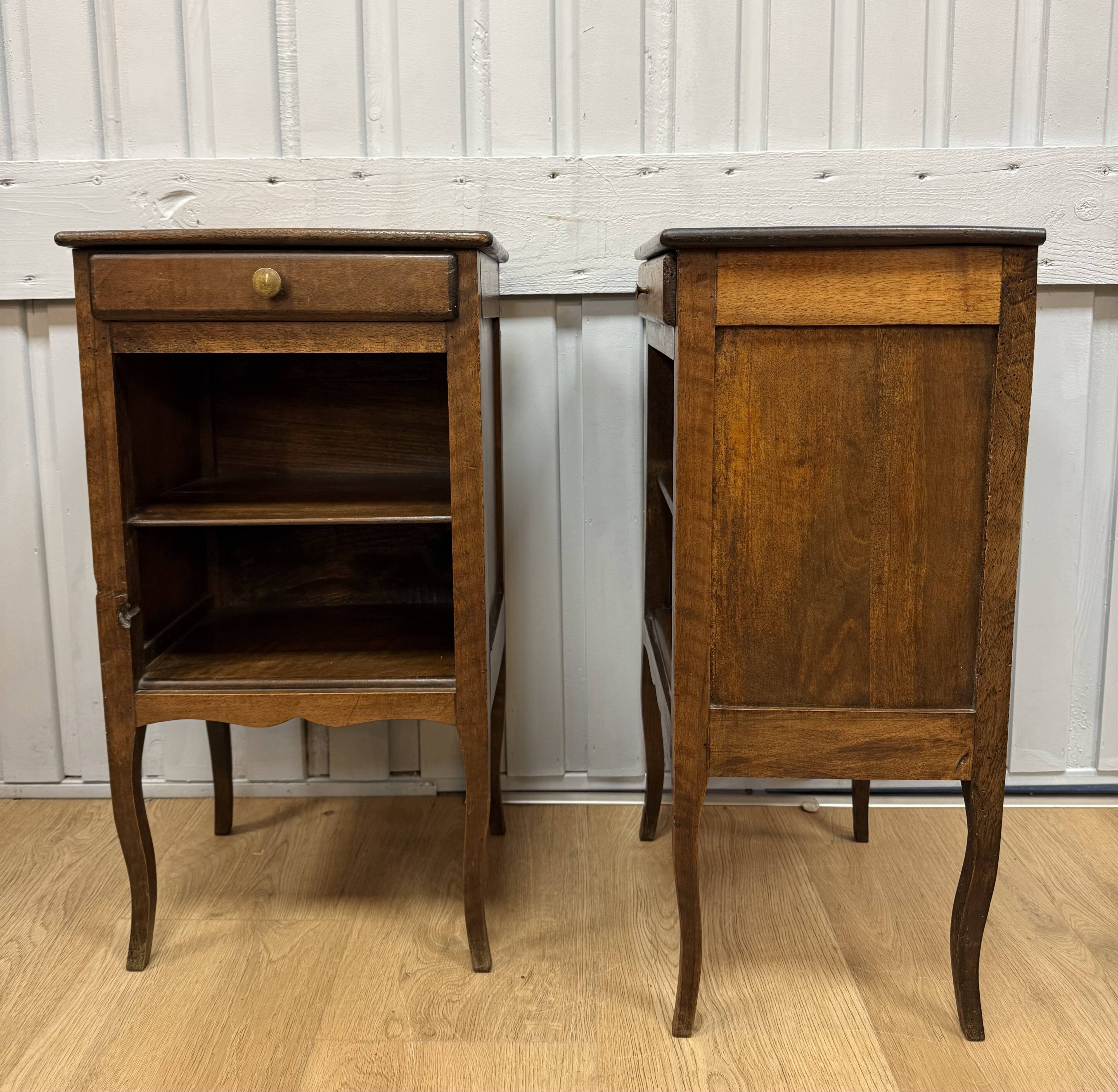 Pair of walnut bedside tables