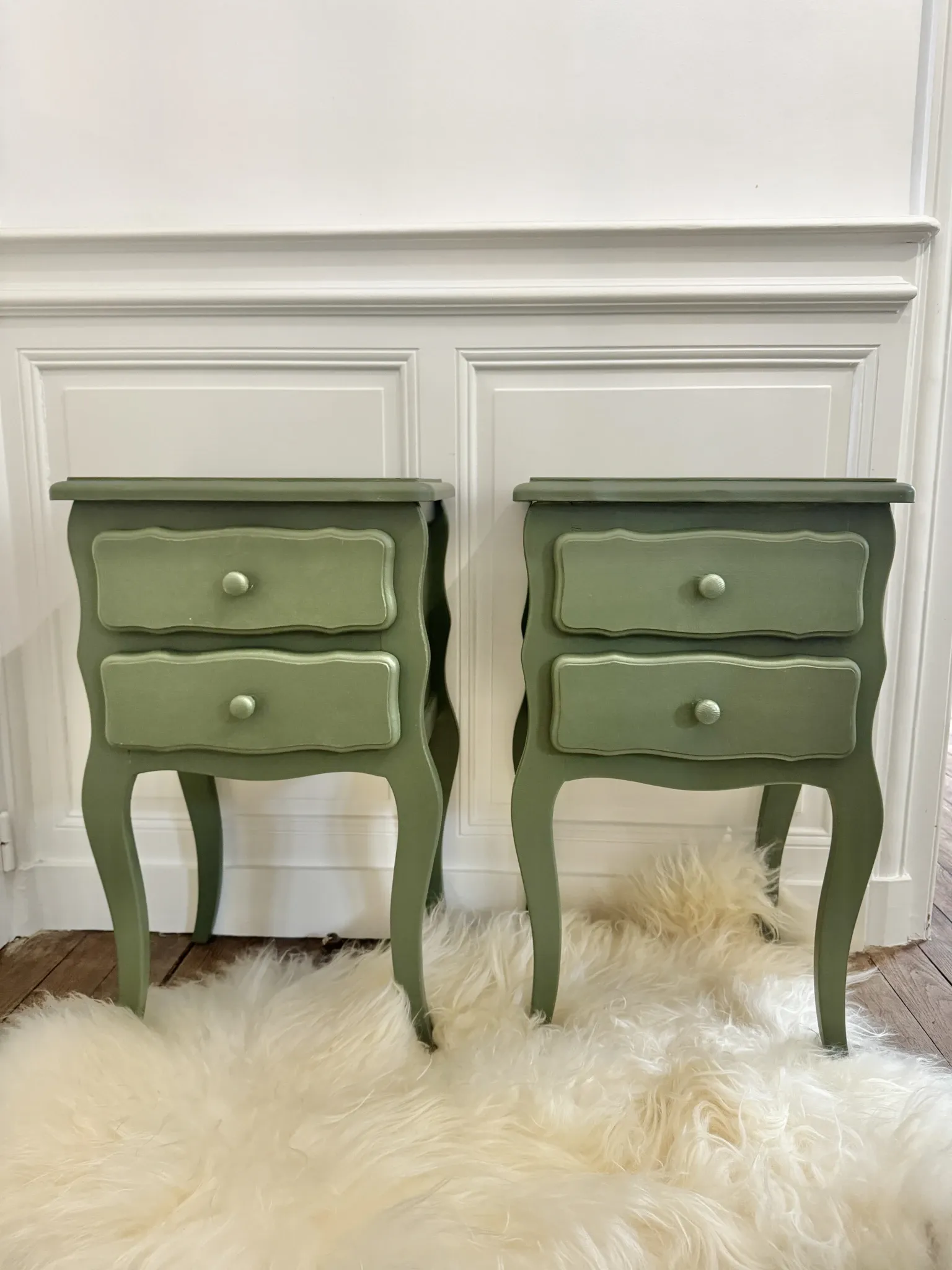 pair of wooden bedside tables