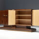 Art Deco walnut sideboard with brass details and sculptural base, France, 1930s