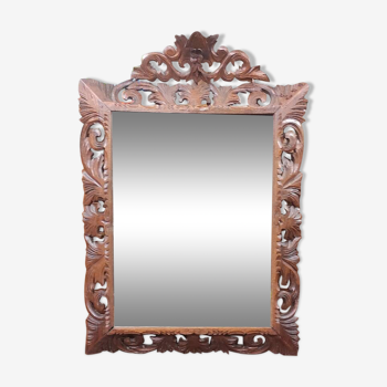 Beveled mirror 1900 carved and openwork oak frame with Henri II style pediment