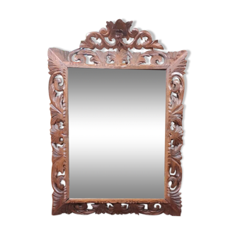 Beveled mirror 1900 carved and openwork oak frame with Henri II style pediment