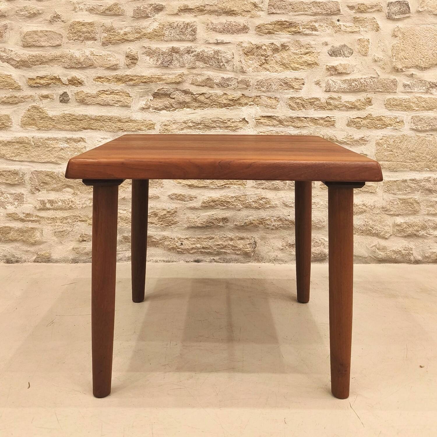 Teak coffee table designed by Niels Bach, Danish production.